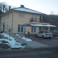 MFH Dornach Westfassade Zufahrt